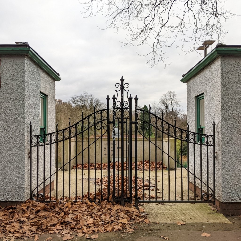 Custom welded iron gate fabricated and installed by Elite Hardscape Inc.